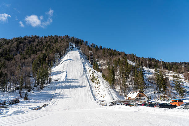 Planica Ski Jump in winter sunny day. Planica Nordic, the valley under the Ponce Mountains, which for decades hosted World Cup in Ski Jumps on Gorišek Brothers Flying Hill.