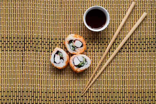 Sushi rolls with salmon, cheese, caviar