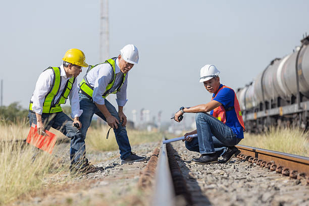 istock Railway Engineers Inspecting Track and Planning Maintenance 2260884674