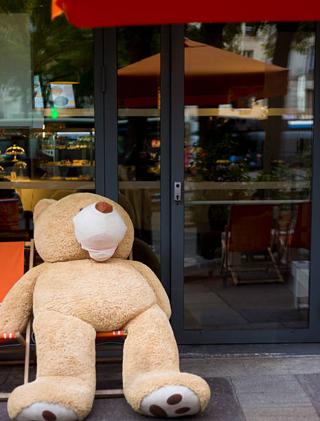 Paris, France: A massive teddy bear sits in a cafe in the Belleville district, 20th arrondissement. (Known as the Teddies of the Gobelins, the bears have popped up all over Paris in recent years)