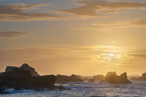 Sunset landscape in Brittany on a beach in Plougrescant