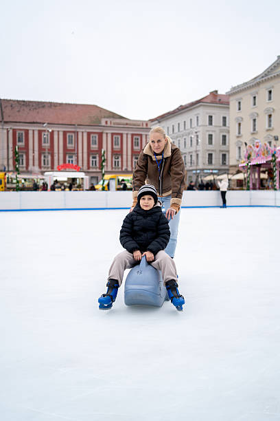 Mother and son on ice skating