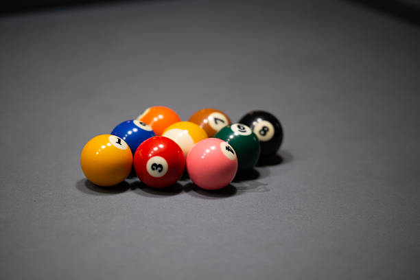 Racked Pool Balls on Gray Billiards Table for 9-ball game
