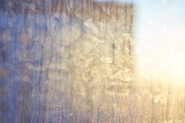 Ice background. Copy space. Frost pattern on glass. Cold weather.