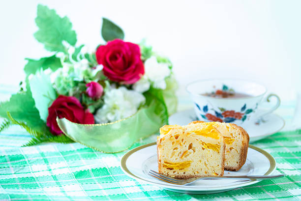 orange pound cake and red roses and hydrangea swag and tea. / red roses and hydrangea bouquet.