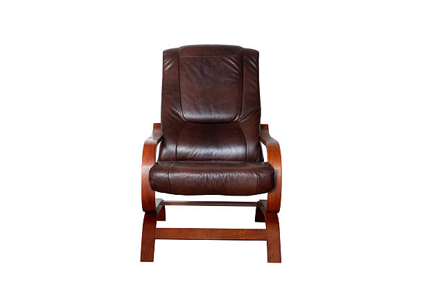 Used brown armchair isolated on white background.