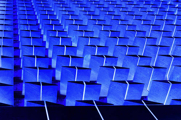 Abstract texture of repeating blue geometric shapes.