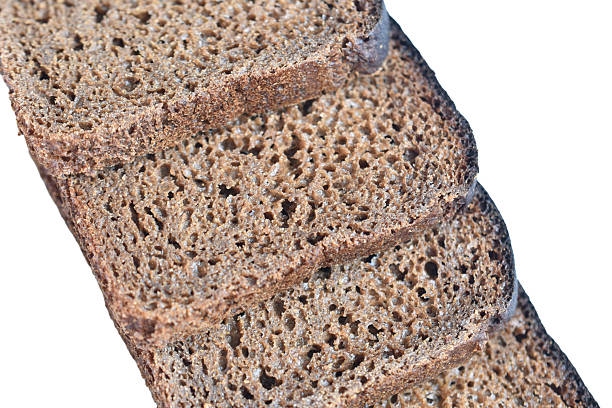 Slices of rye bread isolated on white background.