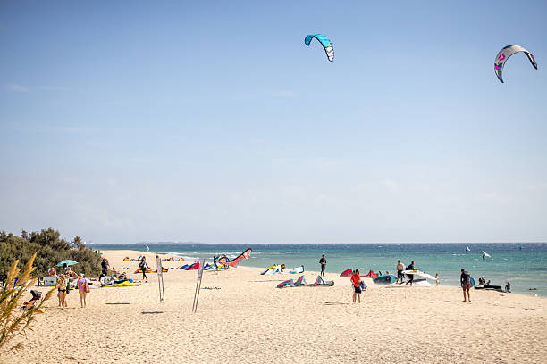 Bolonia Beach, Valdevaqueros beach, Tarifa, Spain on October 15, 2025: View to the Bolonia Beach, Valdevaqueros beach, Tarifa, Spain with wind surfer, kite surfer, wing surfer, watersport equipment, sunny day