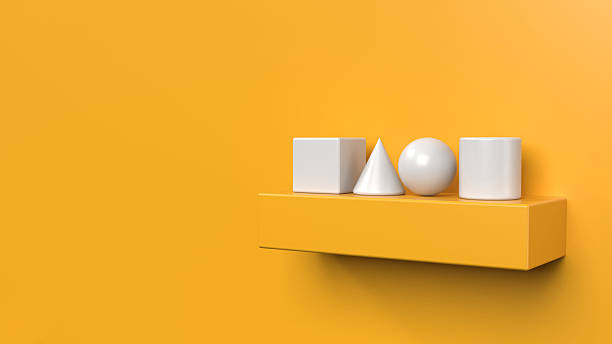 Basic 3D geometric shapes placed on a shelf on shiny bright vibrant yellow background. Elegant cute cartoon shiny objects placed as decoration items on a platform with copy space on wall.
