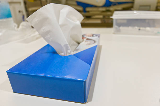 Blue tissue box mock up white tissue box blank label and no text for packaging are placed on a table as a backdrop