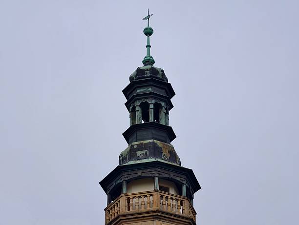 Bavarian maypole (or Maibaum) and church in village Rimsting, Germany.