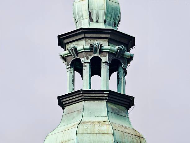 Patinated copper dome with columns, verdigris surface and classical proportions, closeup of lantern