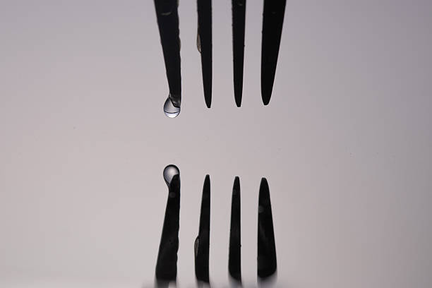 Vintage Silver Fork Reaching Toward Polarized Water – Surreal Liquid Glass Texture, Glasscore, Retro-Kitsch Minimalism 2026
