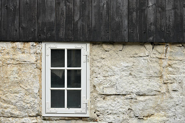 Broken down old wooden wall of school building in Montana ranch country