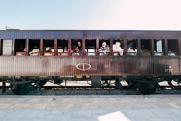 Douro valey, portugal; july 27, 2024: passengers enjoying a scenic journey aboard a vintage train in portugal