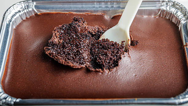 Close-up image of a spoon scooping chocolate. macro of chocolate