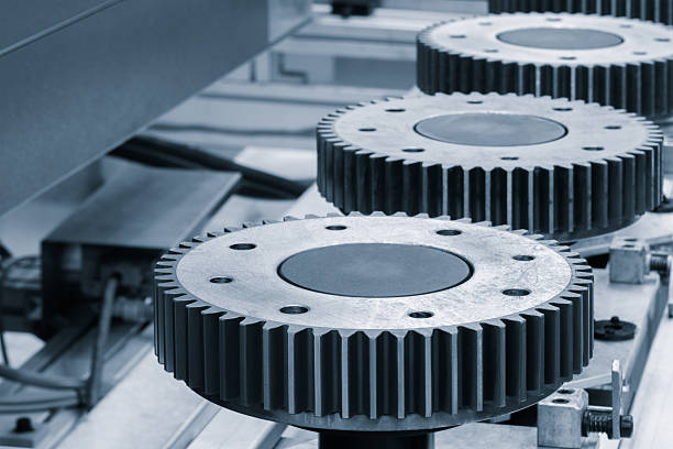 Metallic gear wheels for gearbox, industrial concept background
