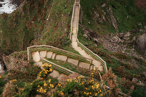 A zigzagging path carved into the dramatic cliffs of Galicia, offering breathtaking views.