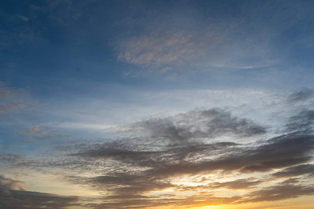 Beautiful colorful sunset with orange clouds. Sky background.