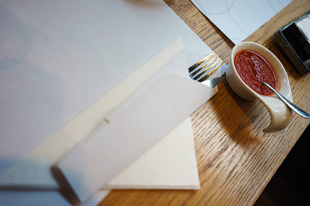 Table prepared at the bar for ordering, tomato sauce in a small ceramic bowl as an aperitif.
