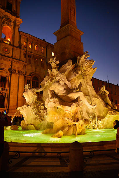 Fontana dei Quattro Fiumi illuminated at night