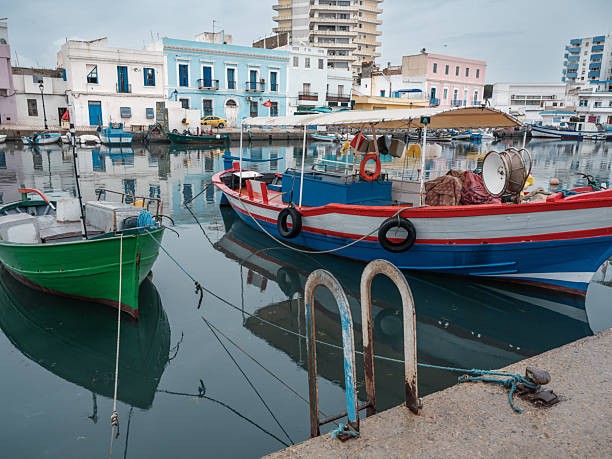 Bizerte, Tunisia - December 19, 2025: Walking along the pier of the Old Port in Bizerte, Tunisia, Nord Africa