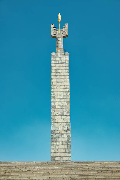 The obelisk (Jim Torosyan and Sargis Gurzadyan, 1967) on the top of the Cascade complex in downtown Yerevan, Armenia, on a sunny day.