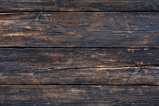 istock Dark brown rustic wooden background texture with grain 2261146194