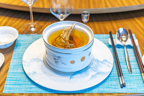 Clear Lamb Chop Soup with Cordyceps Flower in a Ceramic Pot