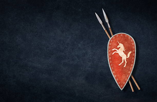 red viking shield and two spears on grunge background