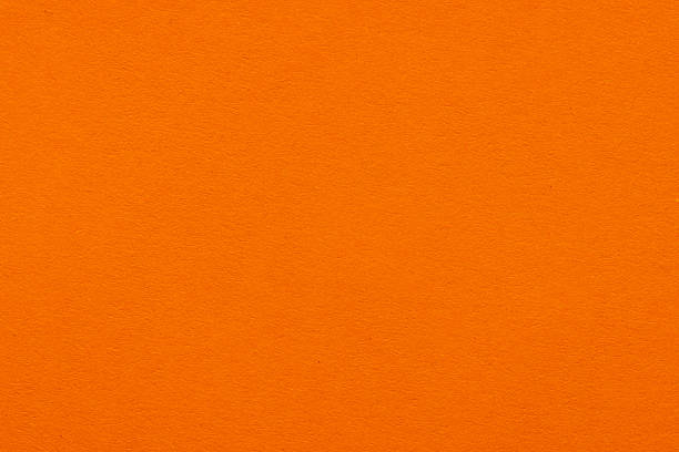 istock Orange paper texture background, subtle, for graphic design, branding mockups, or social media posts. Warm, vibrant,Vibrant Orange Paper Texture Background 2261243331