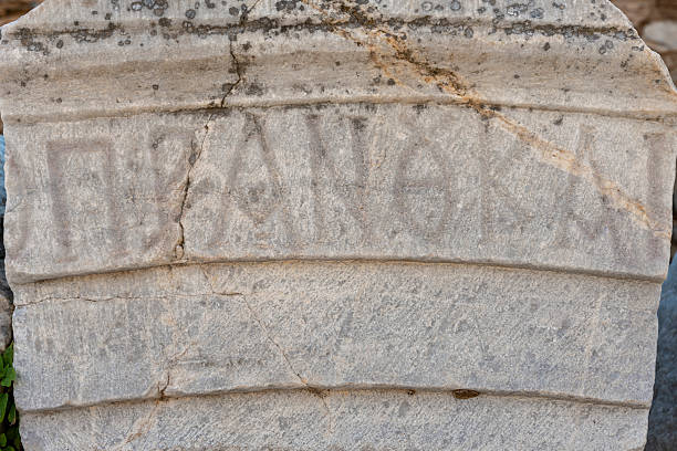 Marble inscription displays Greek text carved in regular lines recording official dedication at Ephesus, Turkey. The well-preserved stone shows characteristic ancient epigraphy mentioning Flavius Constantine, the proconsul. The important inscription represents the public records documenting Ephesus's administration under Roman provincial government, with such texts recording building dedications, transfers of property, and official acts of governors, creating permanent stone archive of the city's political and administrative history while honoring the officials who governed the province of Asia from Ephesus.