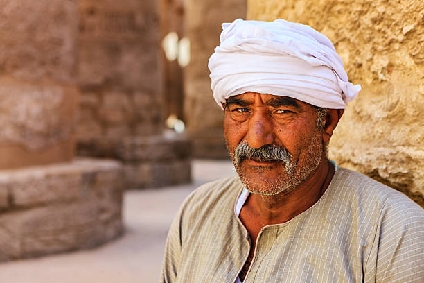 istock Egyptian man in ancient temple, Egypt 2261259013