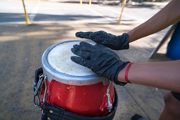 A man playing the congas on the street in Havana