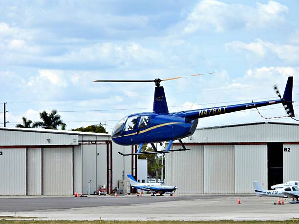 Boca Raton, Palm Beach County, Florida, USA, February 11, 2026. A Robinson helicopter (4 seats / 1 engine) N478AT arriving at the Boca Raton Airport.