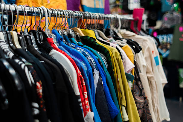 istock Colorful Vibrant Clothing Rack at a Thrift Store 2261313996