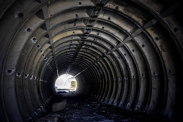 istock Old, abandoned tunnel pipes in Magadan 2261315113