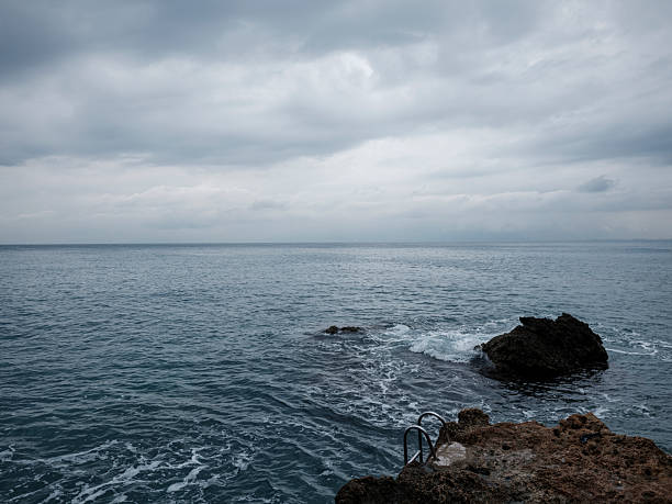 Calm sea view with rocky coastline