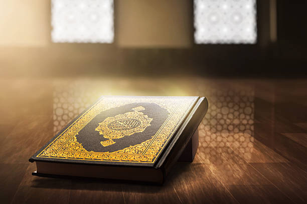 istock Holy book quran in the mosque, eid adha mubarak concept 2261364948