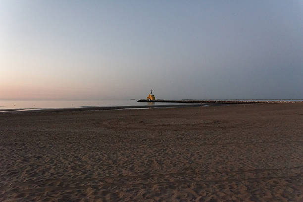 seascape at dawn with the lighthouse