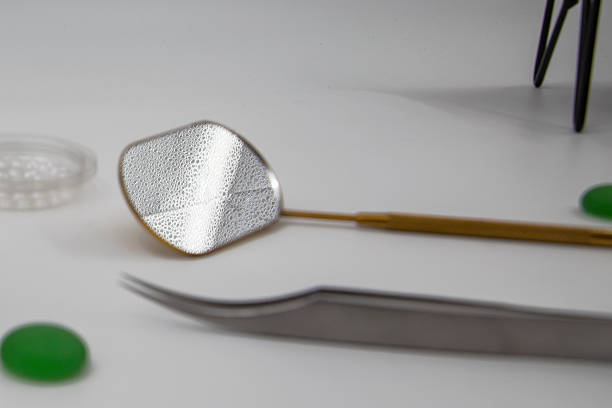 Directly above view of manicure utilities on white background.
