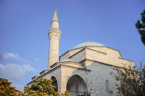 A mosque right next to a famous obelisk that was brought from Egypt and then erected on Byzantine kapitol for the emperor Theodosius I