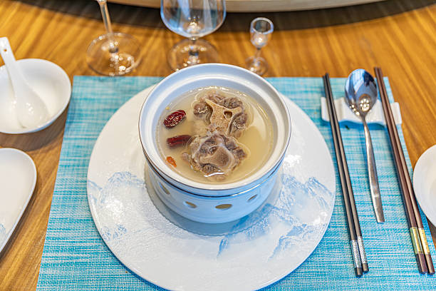 EN: Traditional Chinese Wellness: Braised Oxtail Soup with Red Dates and Goji Berries