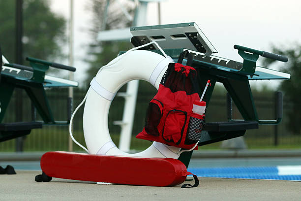 Lifebuoy floating on the surface of the swimming pool
