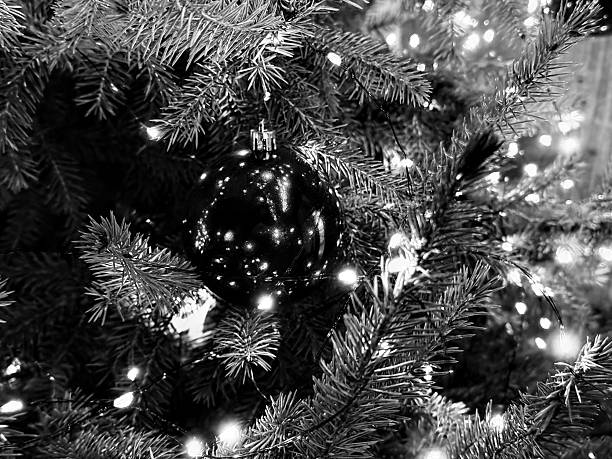Black and White Christmas Tree with Shiny Ornament and Lights