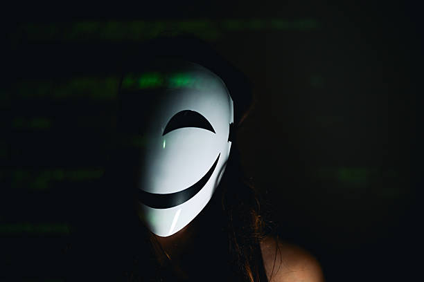 Person wearing white mask showing concept of cyber privacy and hacker identity