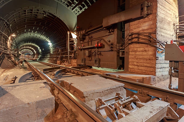 A tunnel of an operating subway with a hermetic gate. The hermetic gate is used as a bomb shelter.