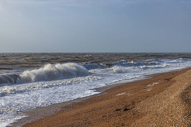 A view out to sea on a sunny December day, from a pebble beach on the Kent coast