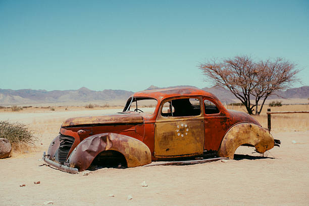 Rusty old car in the desert